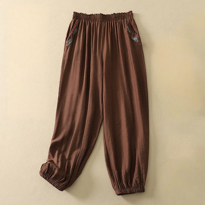 Chic embroidered women's flowy pants, a modern fashion statement. Comfortable and elegant for any occasion.