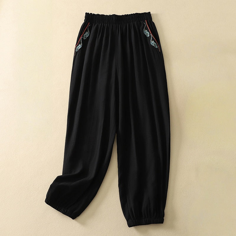 Comfortable women's casual flowy pants with a relaxed fit. Elegant trousers for effortless everyday style.