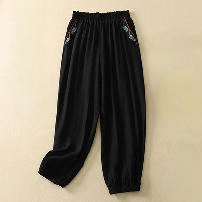 Comfortable women's casual flowy pants with a relaxed fit. Elegant trousers for effortless everyday style.