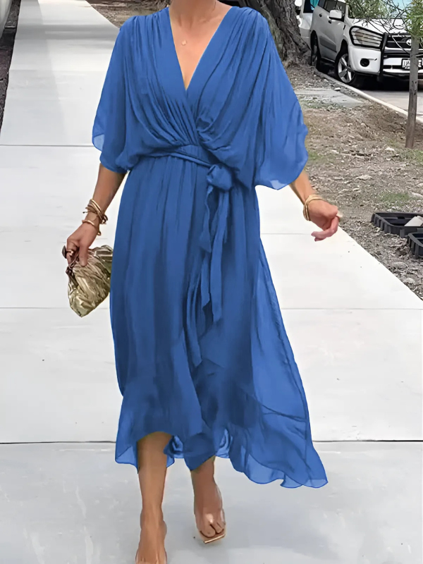 Stylish women's V-neck belted maxi dress. Flowy fabric ensures comfort & elegance for any casual or summer event.