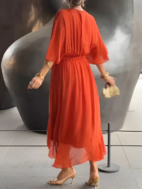 Women's fashion V-neck maxi dress. Featuring a flowy silhouette & belt, it's elegant, comfortable, & ideal for summer.