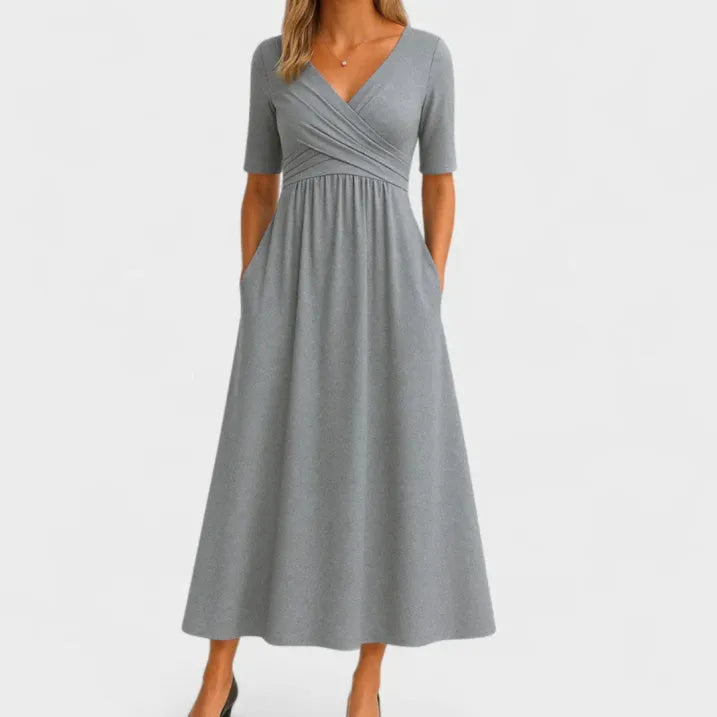Beautiful women's formal midi dress with a V-neck and flowy design, suitable for any special occasion.