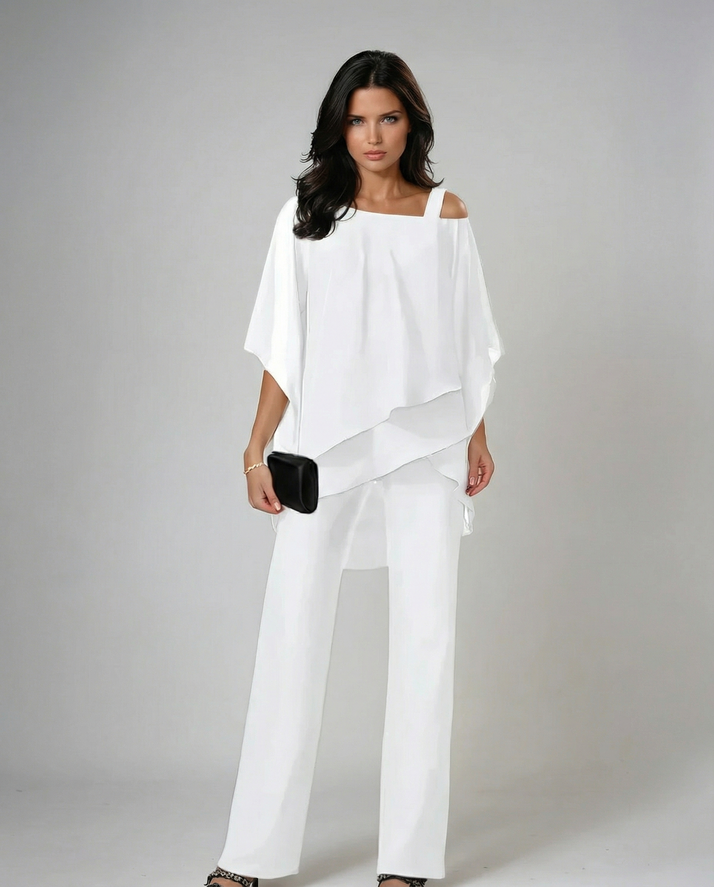 Elegant women's fluid two-piece set with asymmetric top & wide leg pants. Perfect for casual resort wear.