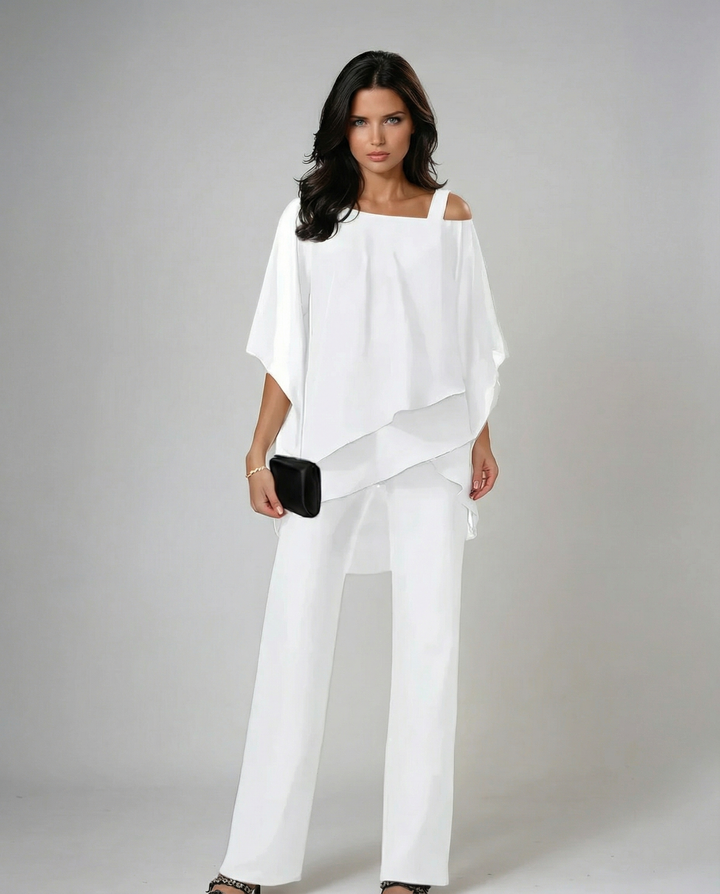 Elegant women's fluid two-piece set with asymmetric top & wide leg pants. Perfect for casual resort wear.