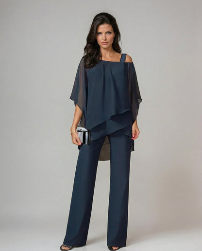 Stylish women's two-piece set: fluid asymmetric top & wide leg pants. Ideal for elegant summer fashion.