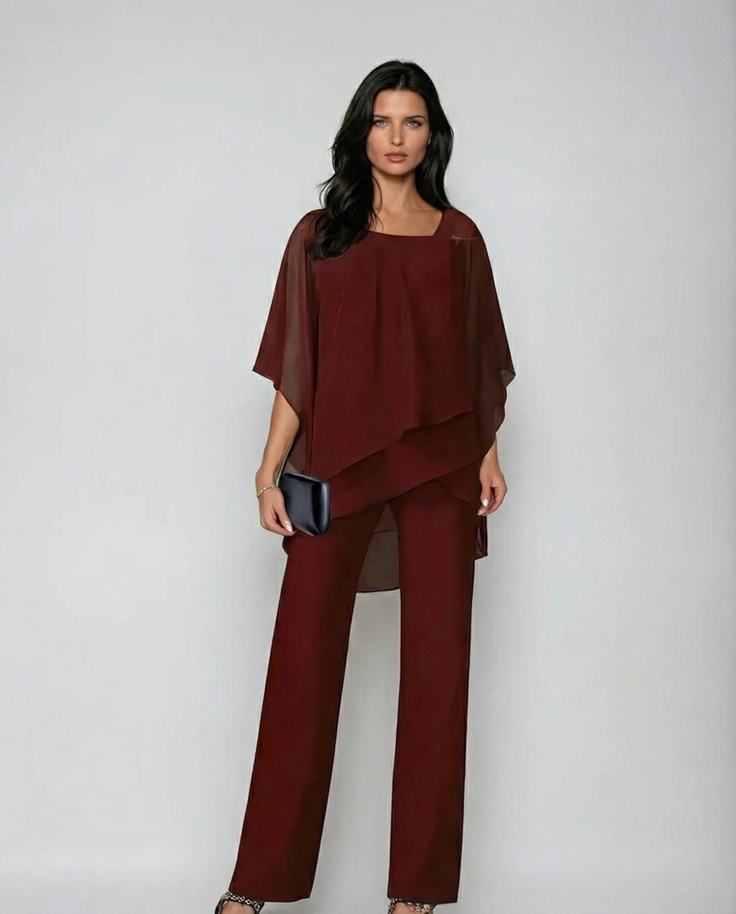 Versatile women's fluid two-piece set, an elegant outfit with wide leg pants & asymmetric top for resort.