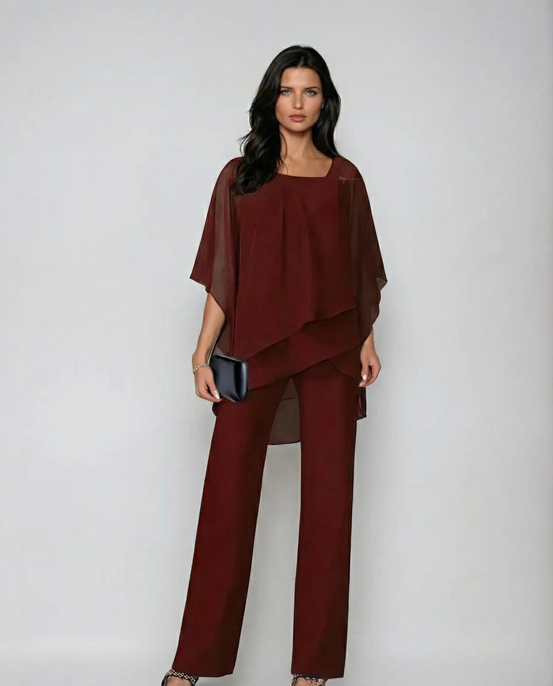 Versatile women's fluid two-piece set, an elegant outfit with wide leg pants & asymmetric top for resort.
