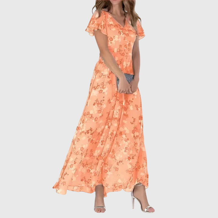 Elegant women's flutter sleeve maxi dress, perfect for evening events. Features a flowy A-line silhouette.