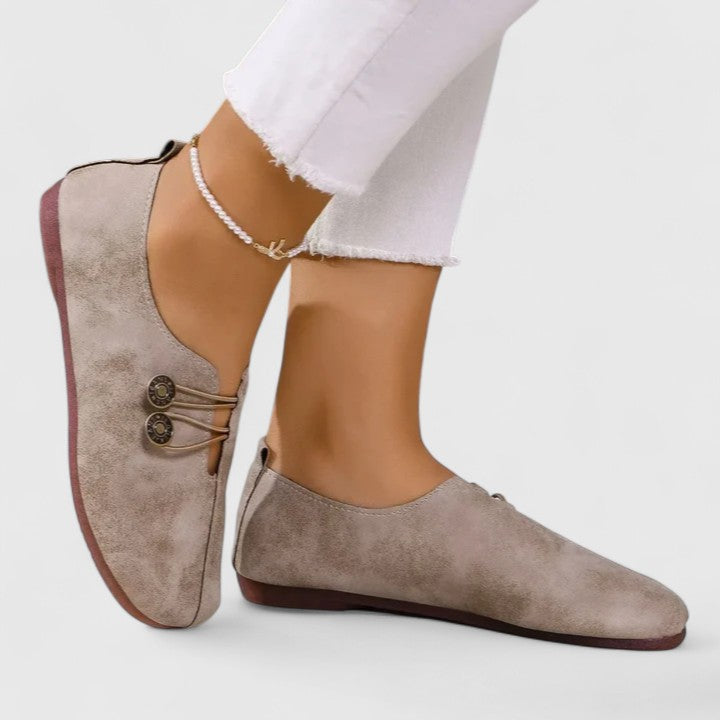 Elegant women's foldable loafers with elastic button closure, perfect for travel & on-the-go comfort.
