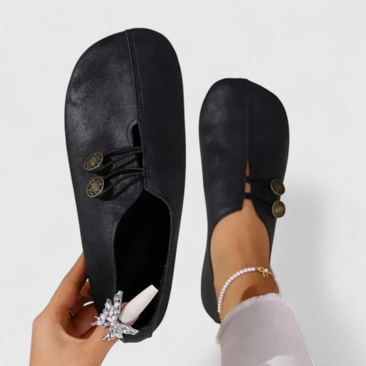 Stylish women's slip-on loafers, featuring a unique elastic button & comfortable padded insole.