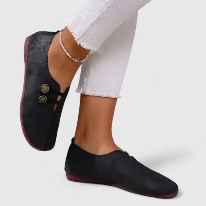 Comfortable women's casual loafers, designed with a padded insole & convenient elastic button closure.