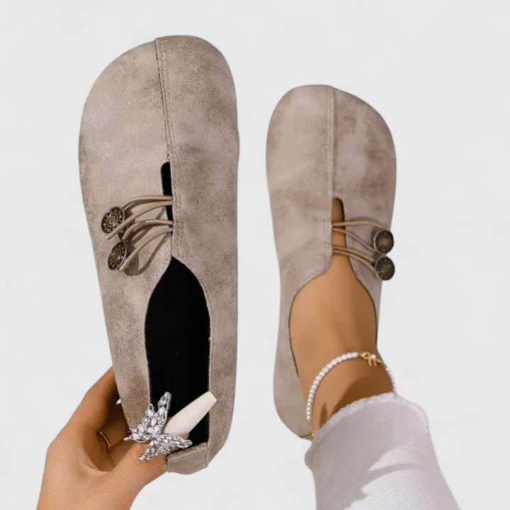 Chic women's footwear: foldable elegant loafers with a secure elastic button, ideal for daily wear.