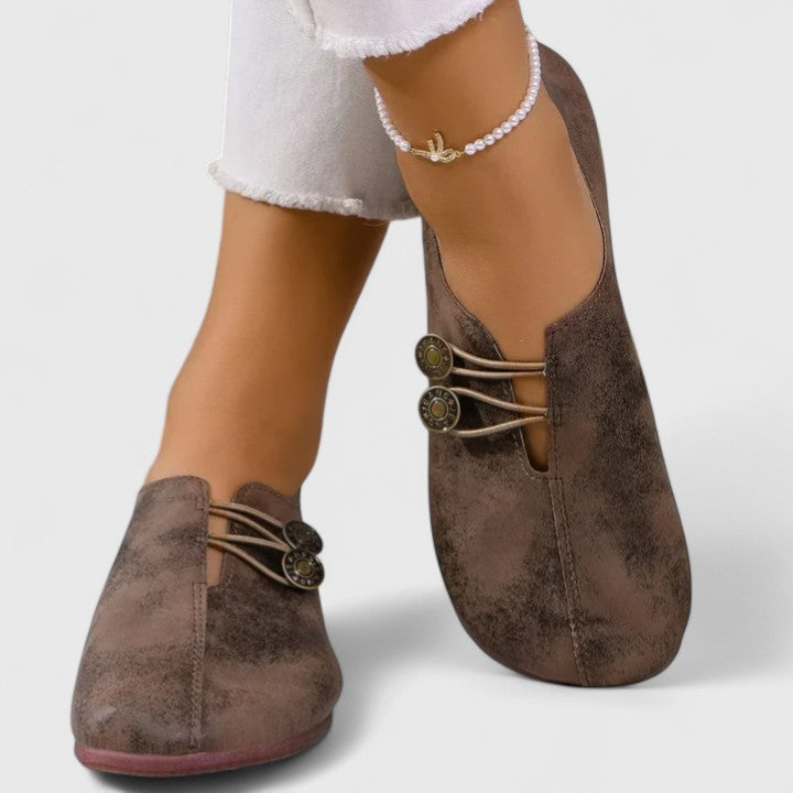 Women's elegant foldable loafers, ideal for travel. Features elastic button closure & comfy padded insole.