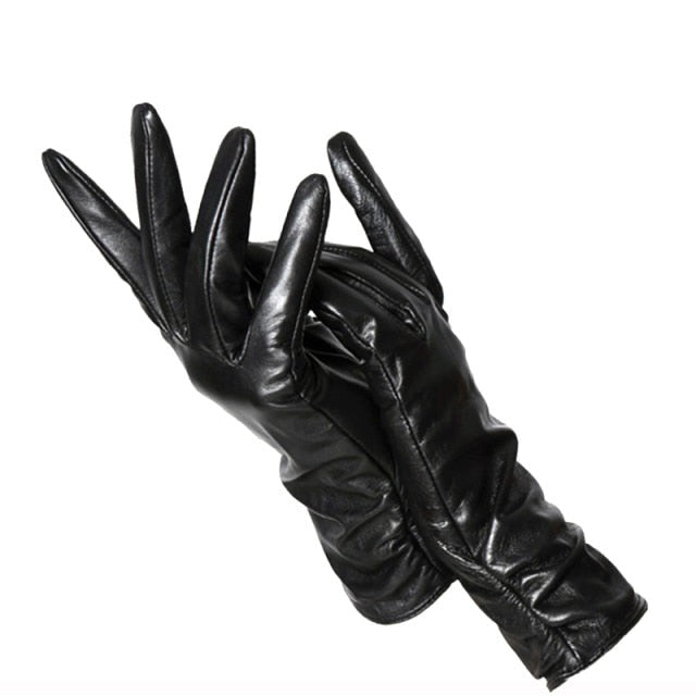 Elegant women's genuine leather gloves. Premium wrist-length design, a sophisticated fashion accessory.