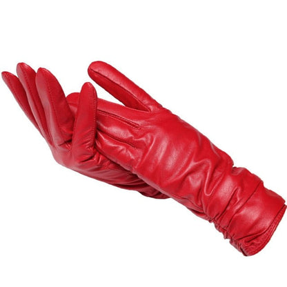 Warm & elegant women's genuine leather gloves. Wrist-length design, perfect as winter wear or driving gloves.