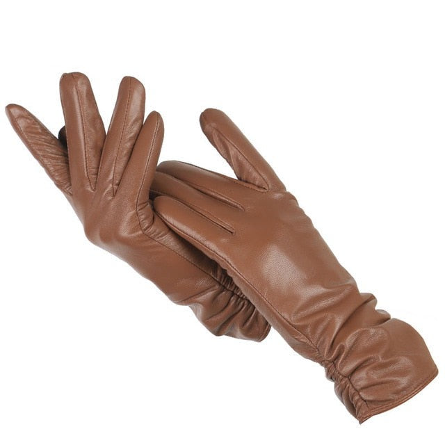 Chic women's wrist-length leather gloves. A timeless fashion accessory for elegant style & cold weather.
