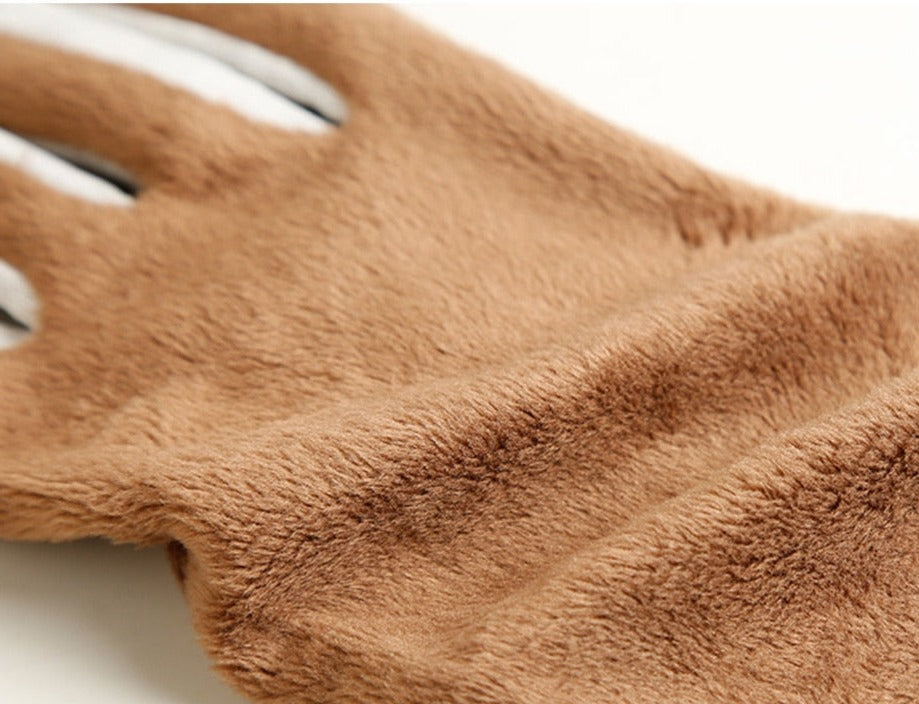 Classic women's genuine leather gloves. Wrist-length, elegant design, perfect for fashion, warmth & driving.