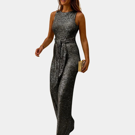 Elegant women's glitter jumpsuit, perfect for parties, evening wear, and special occasions. Shimmering formal outfit.
