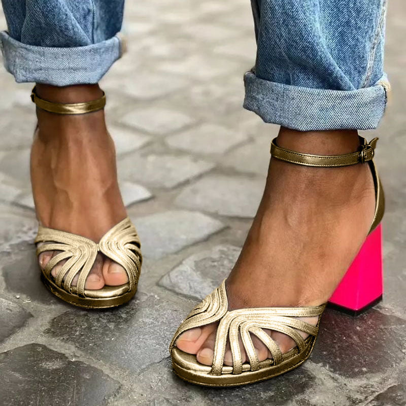 Elegant women's gold block heel sandals with comfortable ankle strap. Classic open-toe dress shoes for summer parties.