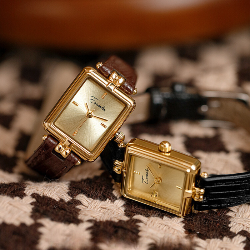 Chic women's accessory: an elegant brown oval wristwatch with a comfortable adjustable strap, a modern classic.