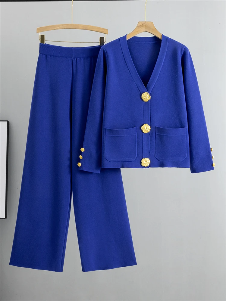 Chic ivory women's two-piece set with elegant gold trim cardigan & wide-leg pants. Versatile matching outfit.