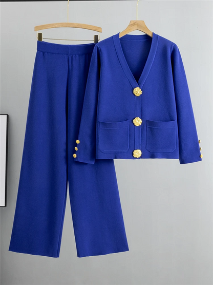 Chic ivory women's two-piece set with elegant gold trim cardigan & wide-leg pants. Versatile matching outfit.
