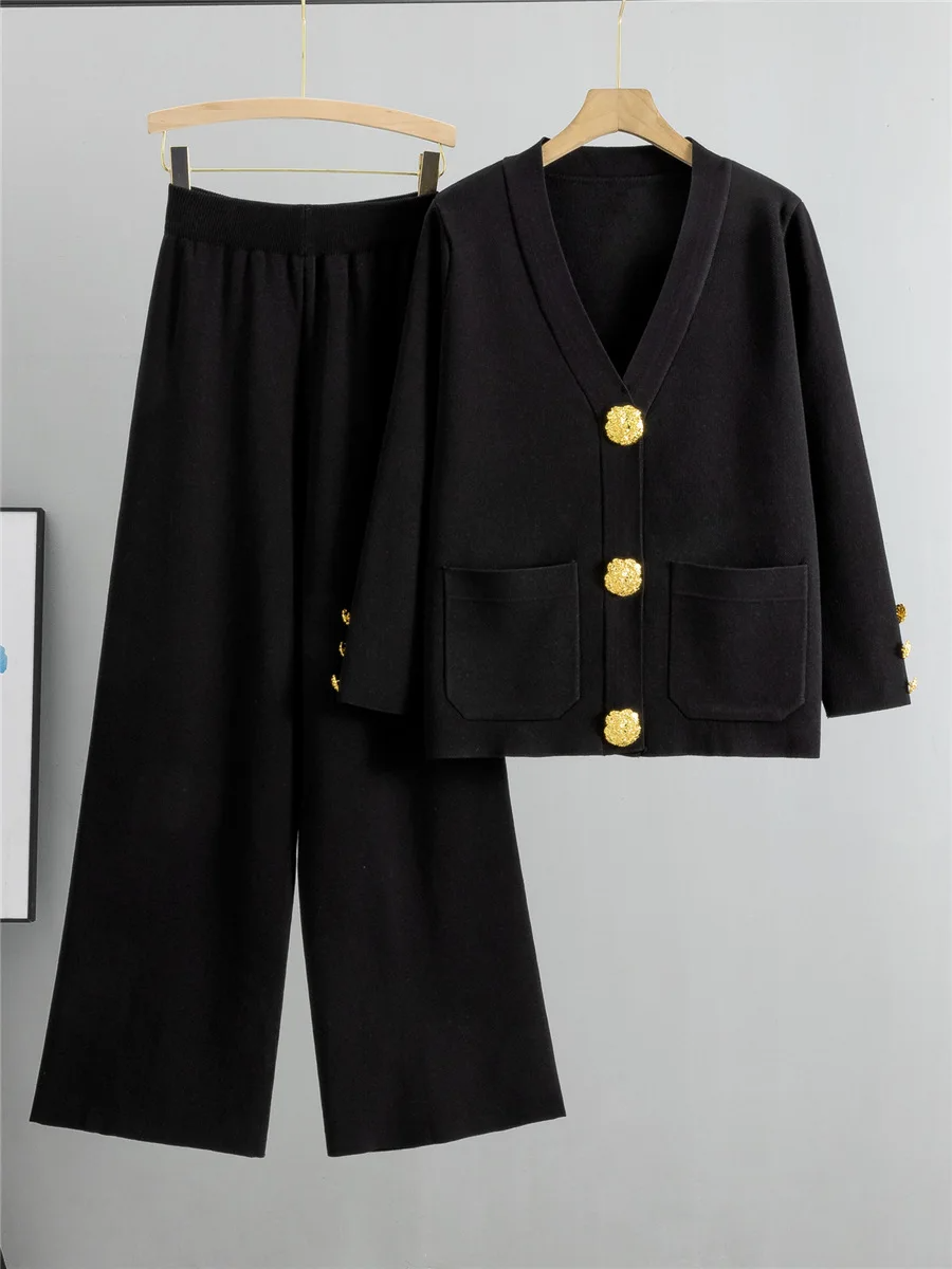 Stylish black women's two-piece ensemble: elegant gold trim cardigan and wide leg pants. Perfect for any occasion.