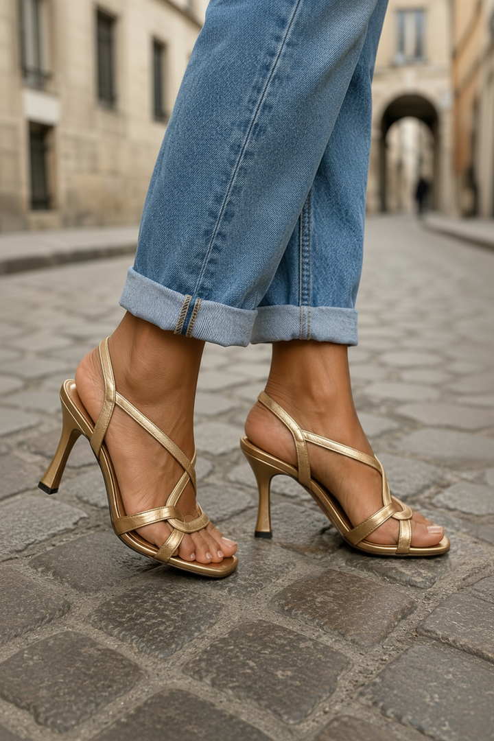 Dressy women's sandals featuring exquisite golden heels; perfect chic footwear for formal & special events.