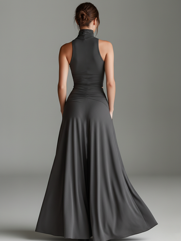 Flowing gray maxi dress, an elegant sleeveless formal wear featuring a flattering cutout waist and ruched skirt.