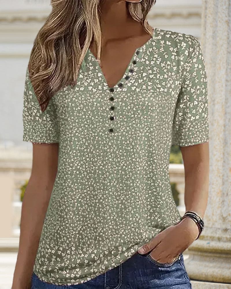 Casual yet elegant women's green floral summer shirt, a short-sleeve top for everyday wear or vacation.