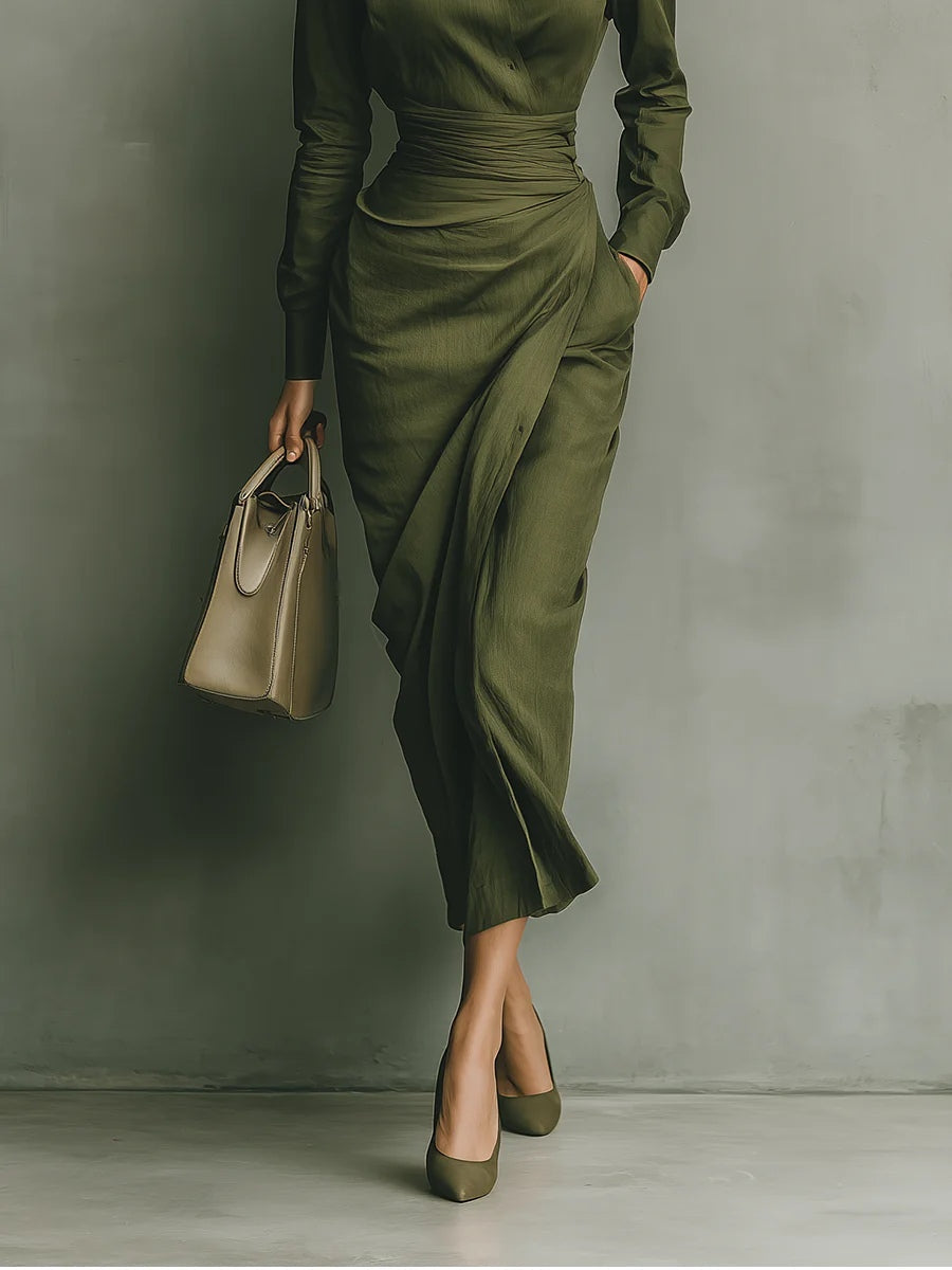 Sophisticated women's green wrap dress, elegant midi length with long sleeves, ideal for versatile styling.