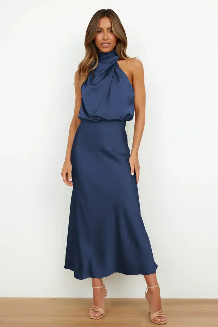 Elegant women's long halter dress, featuring a flattering silhouette & luxurious fabric.
