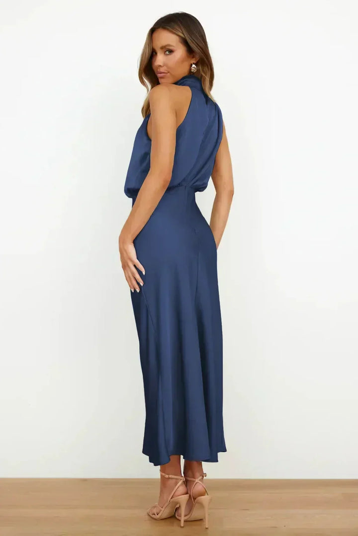 Halter neck floor-length formal dress, a sophisticated open-back evening gown for women.
