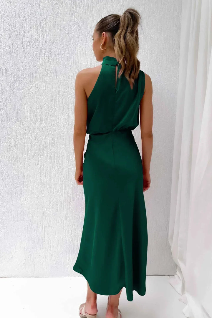 Timeless women's floor-length halter dress, an elegant open-back evening gown for formal events.