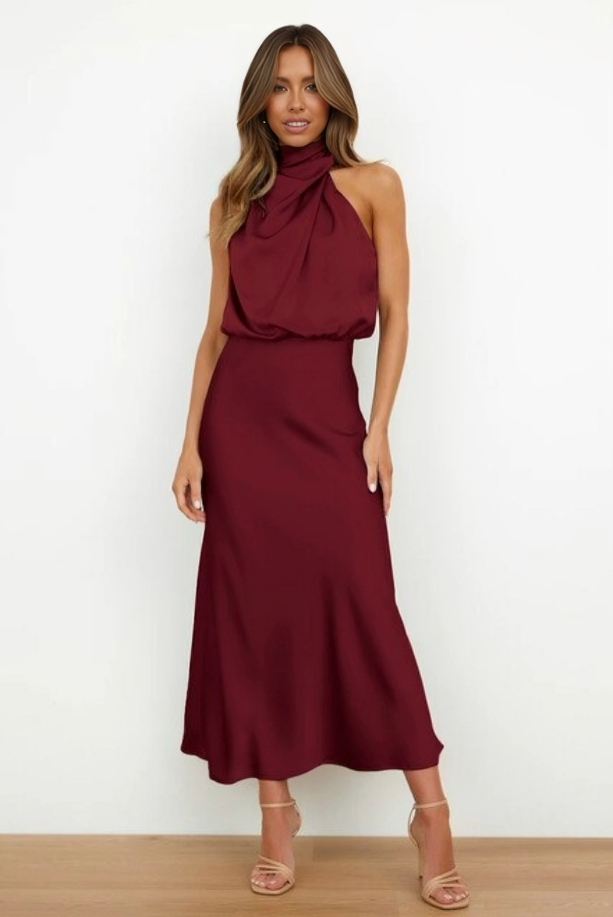 Glamorous women's gala dress, a floor-length halter evening gown with a chic open-back detail.