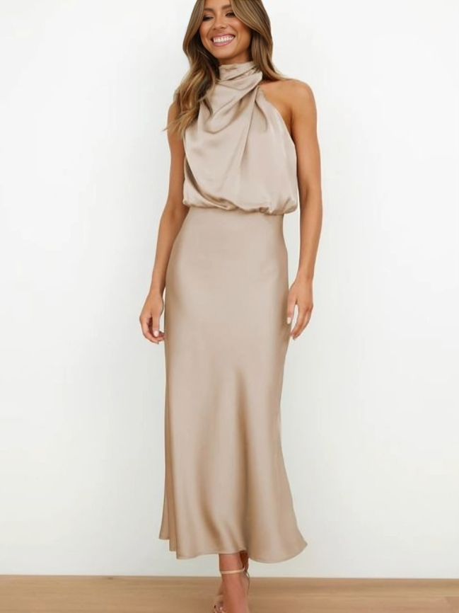Sophisticated open-back long party dress. Women's elegant halter evening gown.