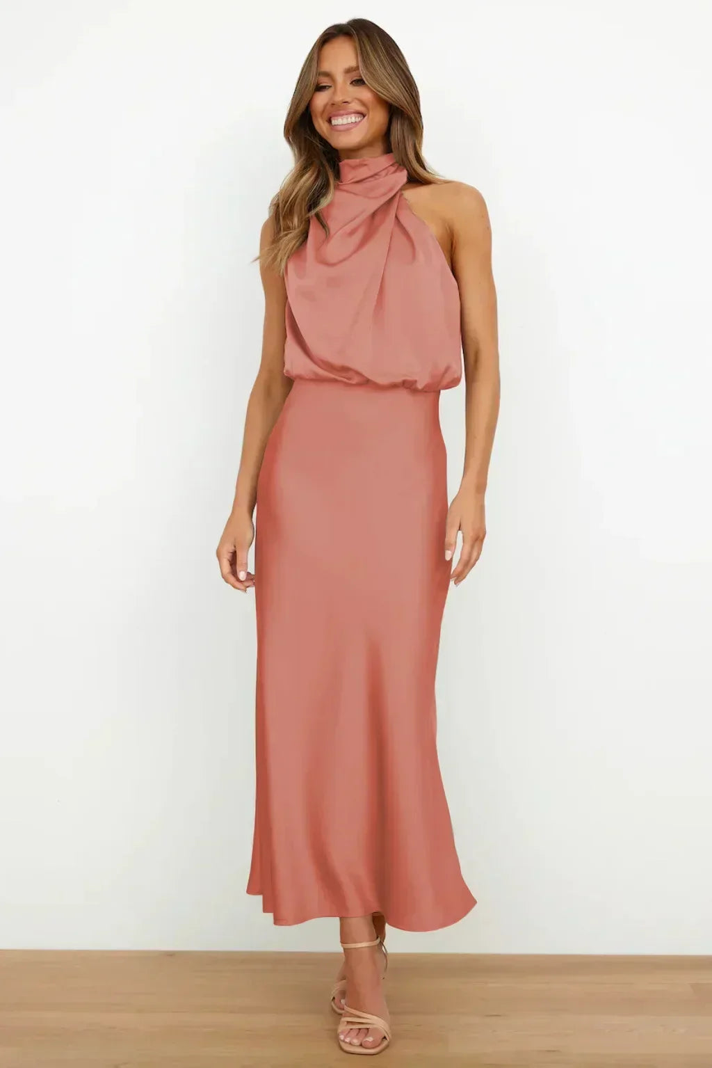 Side view: Graceful women's floor-length halter dress, perfect for elegant special occasions.