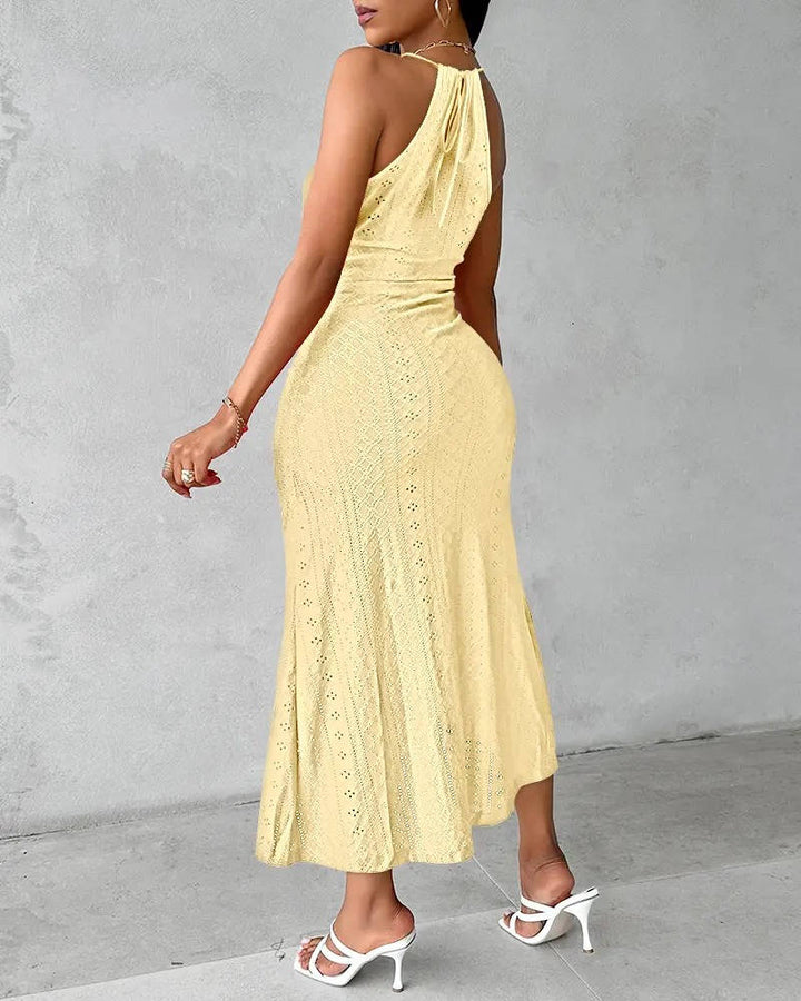 Stylish women's beach formal A-line maxi dress, halter neck with a graceful slit. Perfect for vacation & resort wear.