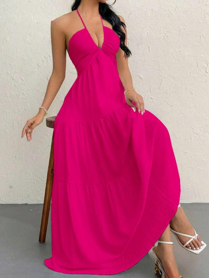 Soft, flowing women's elegant halter maxi dress. Long tiered design, perfect for summer comfort & party style.