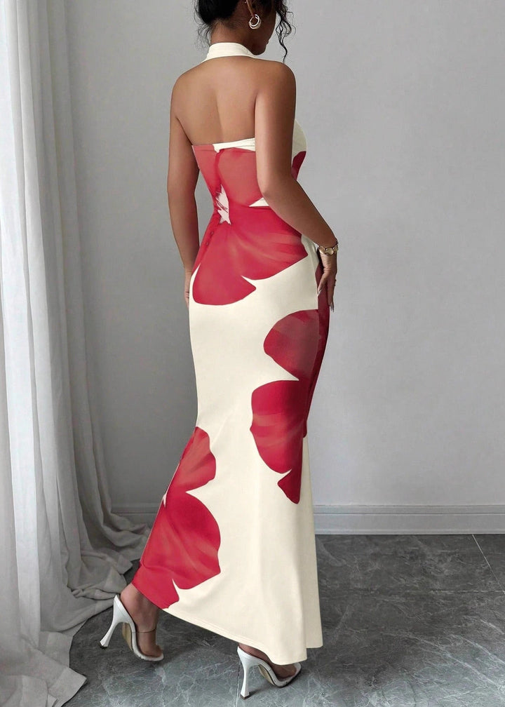 Red halter maxi dress with a striking floral print, designed for sophisticated women's occasion wear.