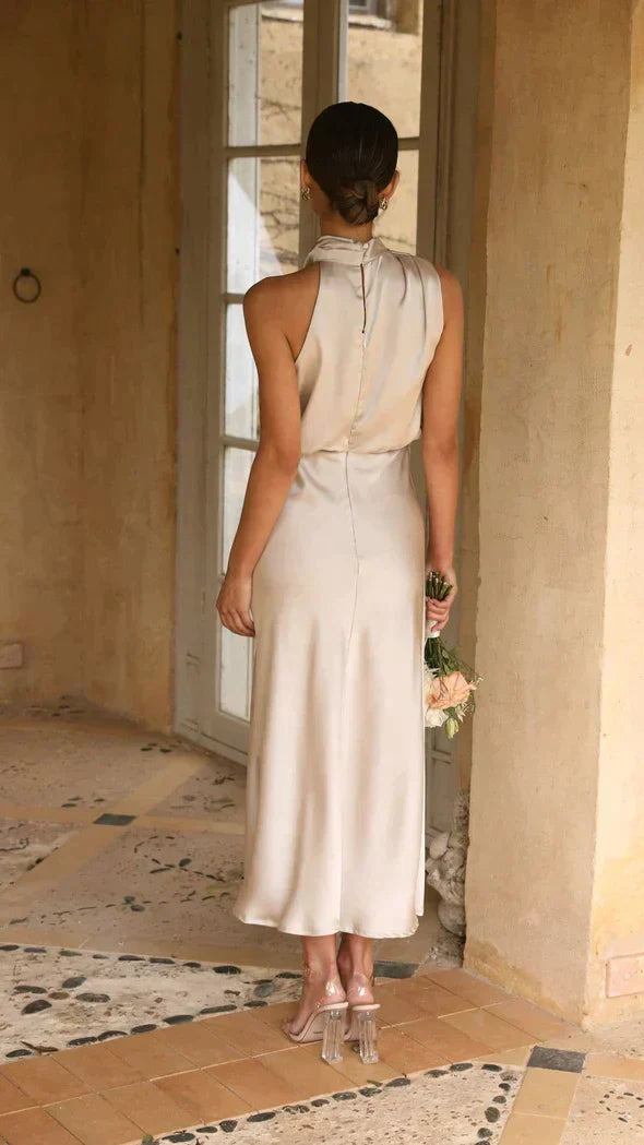 Flowing Halter Midi Dress for women, ideal for summer parties and special occasions.