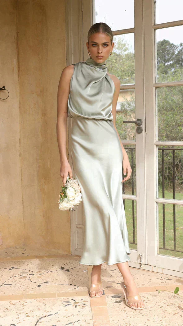 Chic Women's Midi Dress with halter neckline, great for formal wear and wedding guest attire.