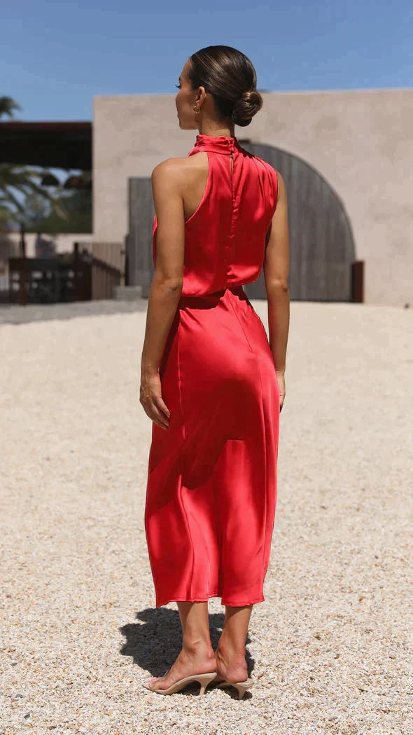 Formal women's midi dress with halter neck, ideal for weddings, parties, and special events.