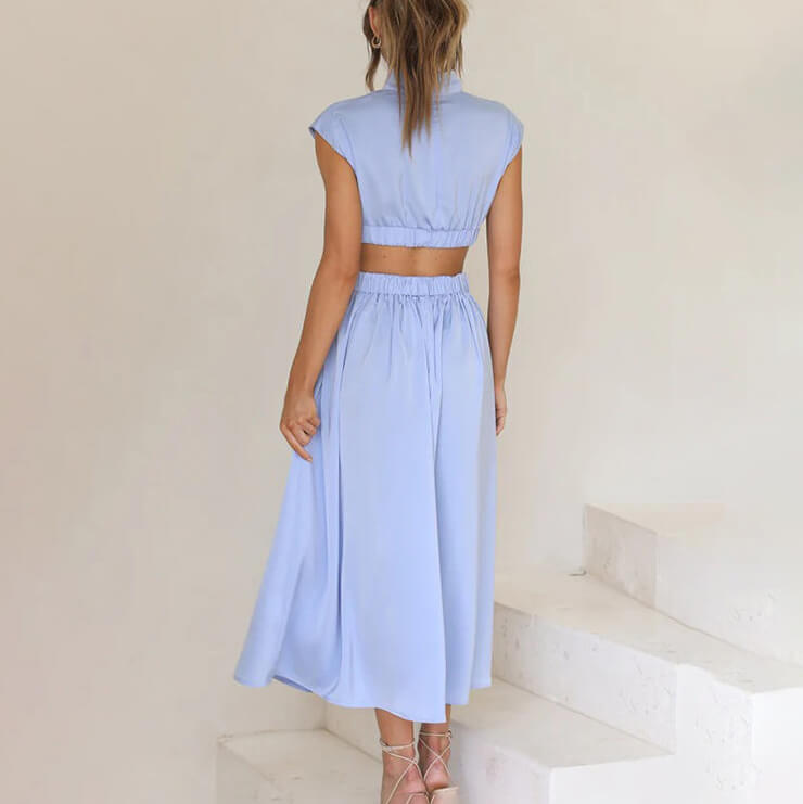 Summer-ready women's halter midi dress, offering an elegant look with its stylish side slit.