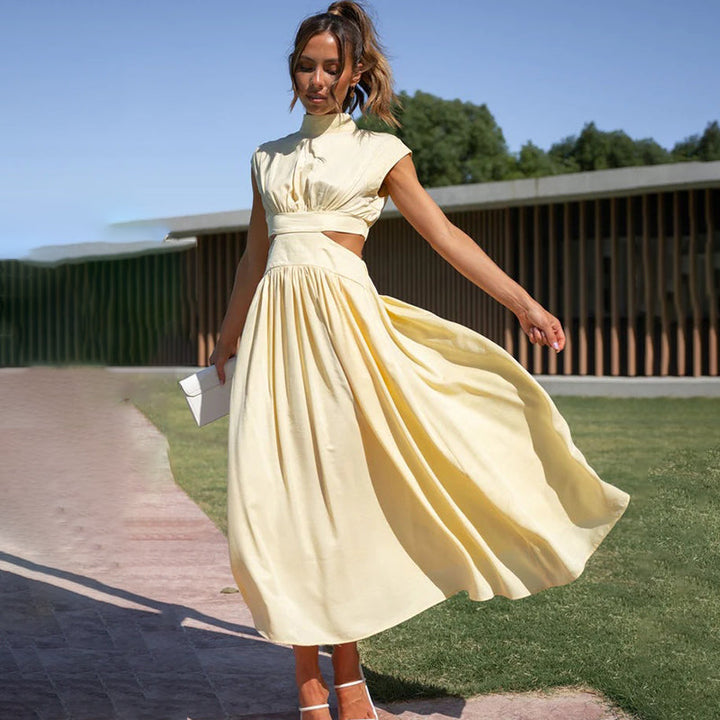Graceful women's midi halter dress, featuring a sophisticated side slit, suitable for elegant wear.