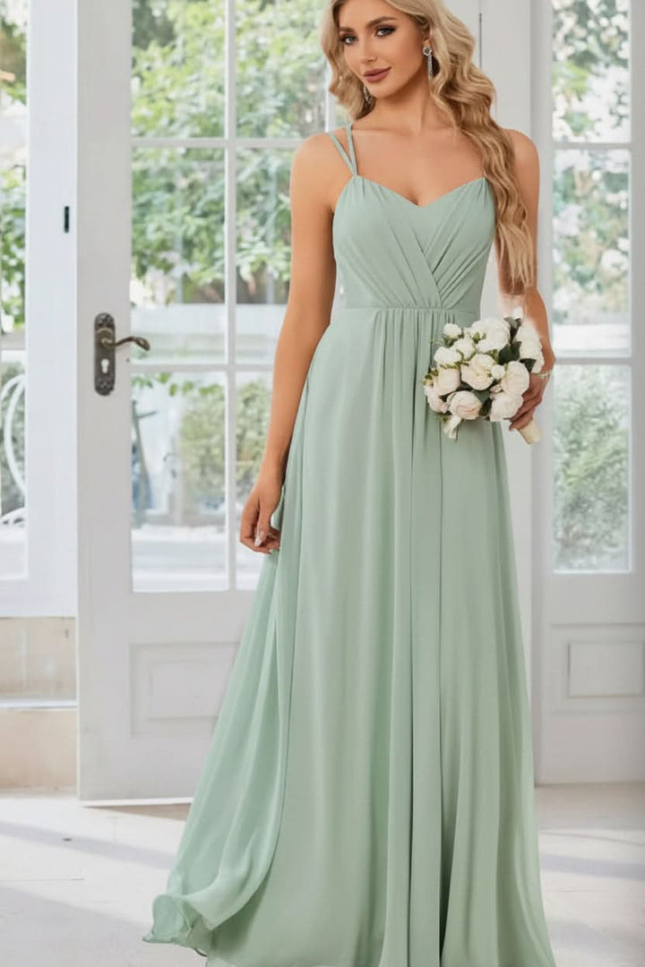 Floor-length women's elegant halter neck maxi dress with keyhole detail, suitable for evening wear.