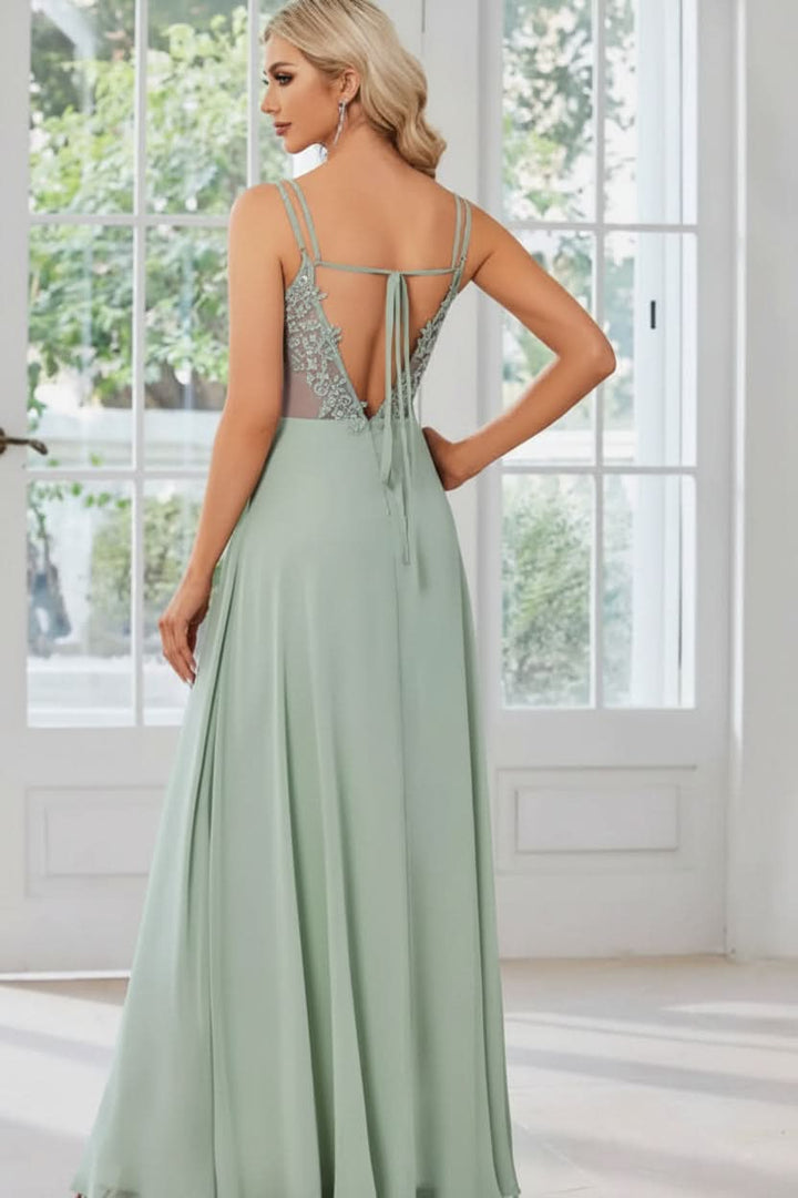 Elegant women's halter neck maxi formal gown with keyhole detail, perfect for special occasion events.
