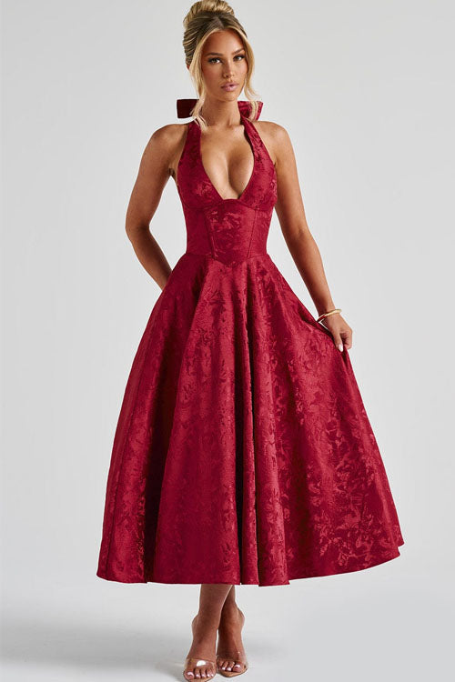 Long halterneck party dress, perfect for women attending prom or homecoming.