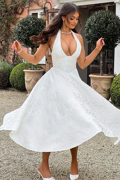 Chic women's prom night gown, elegant halterneck and A-line silhouette.