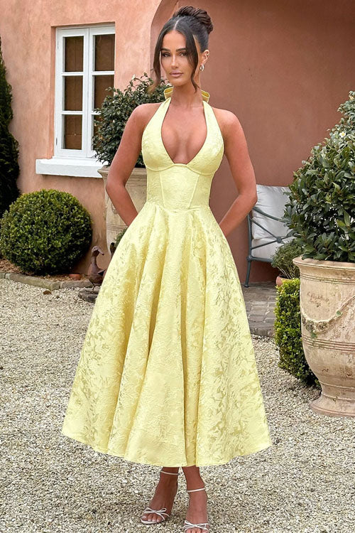 Sophisticated women's prom dress, maxi length, chic halterneck.